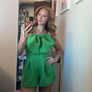 Hazel and Olive green romper with bow in the front